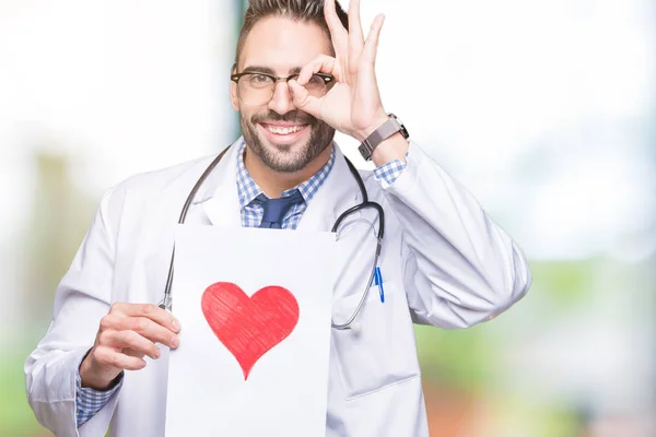 Bonito Jovem Médico Homem Segurando Papel Com Coração Vermelho Sobre — Fotografia de Stock