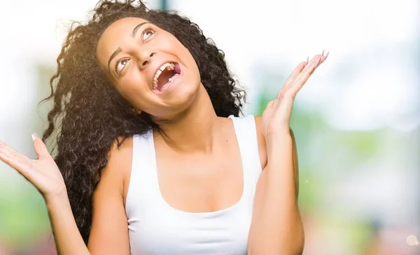 Young Beautiful Girl Curly Hair Celebrating Crazy Amazed Success Arms — Stock Photo, Image