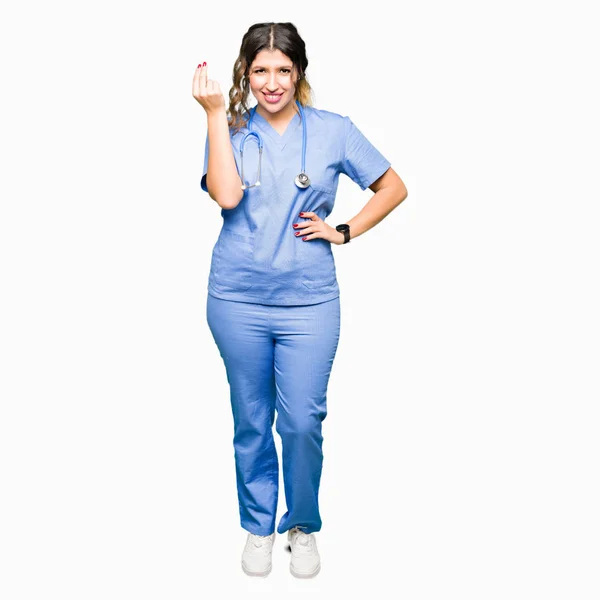 Young Adult Doctor Woman Wearing Medical Uniform Doing Italian Gesture — Stock Photo, Image