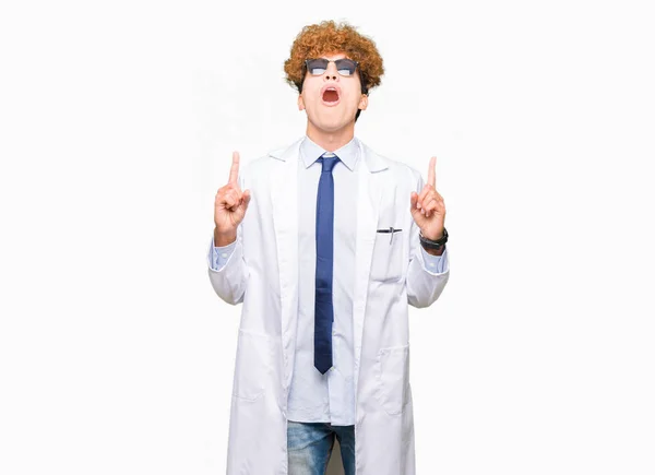 Young Handsome Scientist Man Wearing Professional Coat Sunglasses Amazed Surprised — Stock Photo, Image