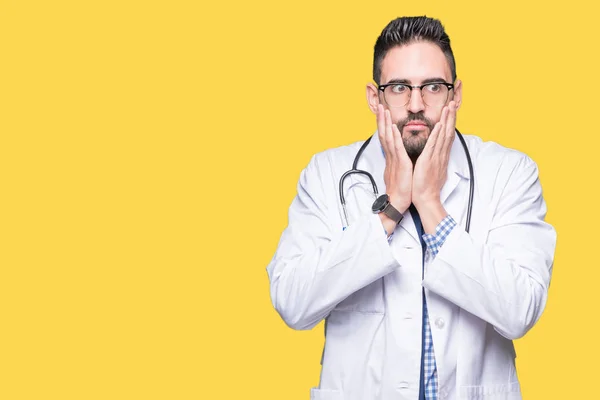 Guapo Joven Doctor Hombre Sobre Fondo Aislado Manos Cansadas Cubriendo — Foto de Stock