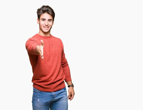 Joven Hombre Guapo Sobre Fondo Aislado Sonriendo Amistoso Ofreciendo Apretón — Foto de Stock