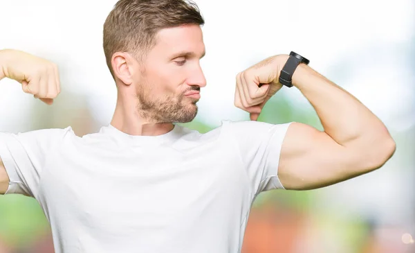 Handsome Man Wearing Casual White Shirt Showing Arms Muscles Smiling — Stock Photo, Image