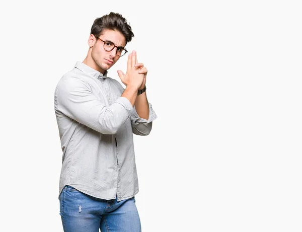 Young Handsome Man Wearing Glasses Isolated Background Holding Symbolic Gun — Stock Photo, Image