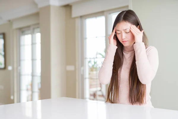 Beautiful Asian Woman Wearing Casual Sweater White Table Hand Head — Stock Photo, Image