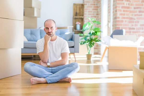 Young Bald Man Sitting Floor Cardboard Boxes Moving New Home — Stockfoto
