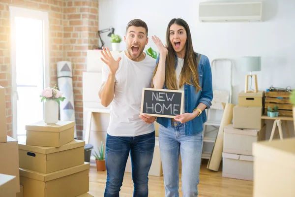 Young Beautiful Couple Holding Blackboard New Home Text New House — 스톡 사진