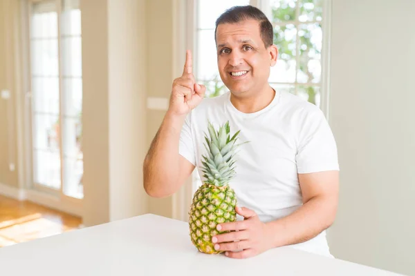 Middle Age Man Eating Fresh Tropical Pineapple Home Surprised Idea — Stock Photo, Image