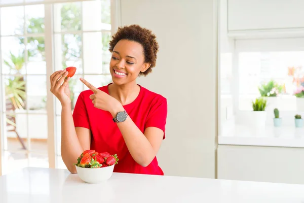 Young African American Woman Eating Fresh Strawberries Breakfast Very Happy — Stock Photo, Image