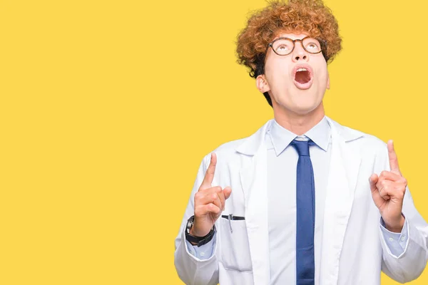 Young Handsome Scientist Man Wearing Glasses Amazed Surprised Looking Pointing — Stock Photo, Image