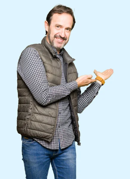 Middle Age Handsome Man Wearing Winter Vest Inviting Enter Smiling — Stock Photo, Image