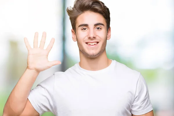 Joven Hombre Guapo Con Camiseta Blanca Sobre Fondo Aislado Mostrando — Foto de Stock