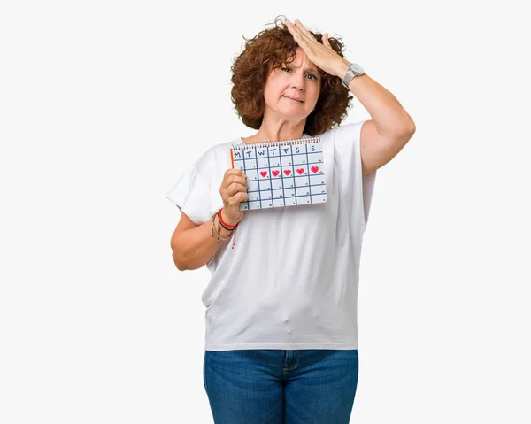 Middle Ager Senior Woman Holding Menstruation Calendar Isolated Background Stressed — Stock Photo, Image