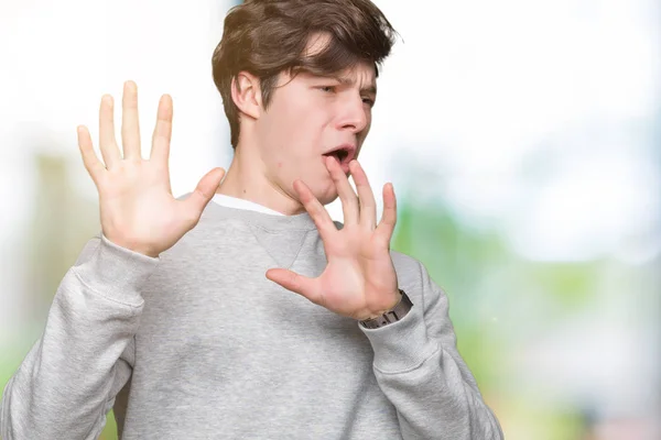 Young Handsome Sporty Man Wearing Sweatshirt Isolated Background Afraid Terrified — Stock Photo, Image