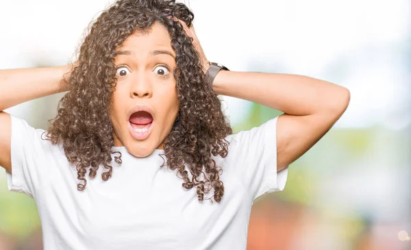 Young Beautiful Woman Curly Hair Wearing White Shirt Crazy Scared — Stock Photo, Image