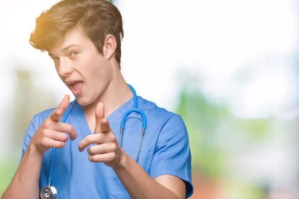 Young Doctor Wearing Medical Uniform Isolated Background Pointing Fingers Camera — Stock Photo, Image