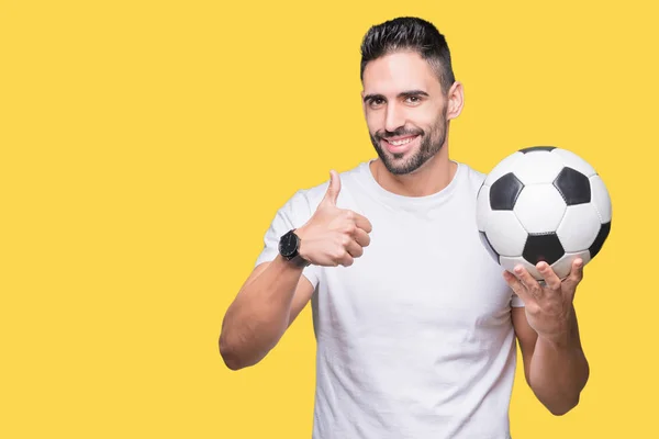 Giovane Uomo Che Tiene Palla Calcio Sfondo Isolato Felice Con — Foto Stock