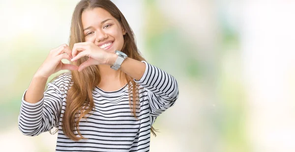 Jonge Mooie Brunette Vrouw Strepen Trui Dragen Geïsoleerde Achtergrond Glimlachend — Stockfoto