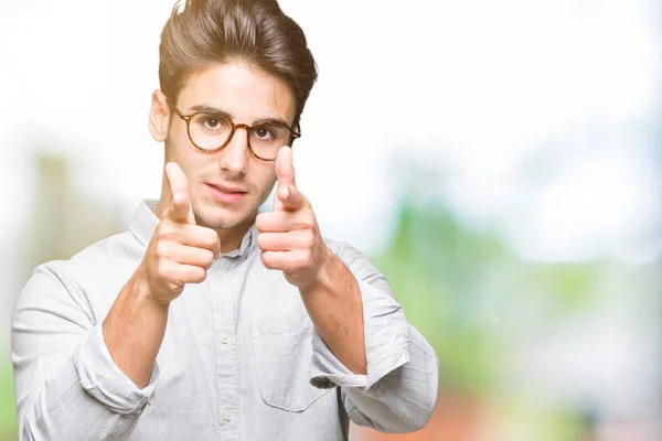 Joven Hombre Guapo Con Gafas Sobre Fondo Aislado Señalando Los —  Fotos de Stock