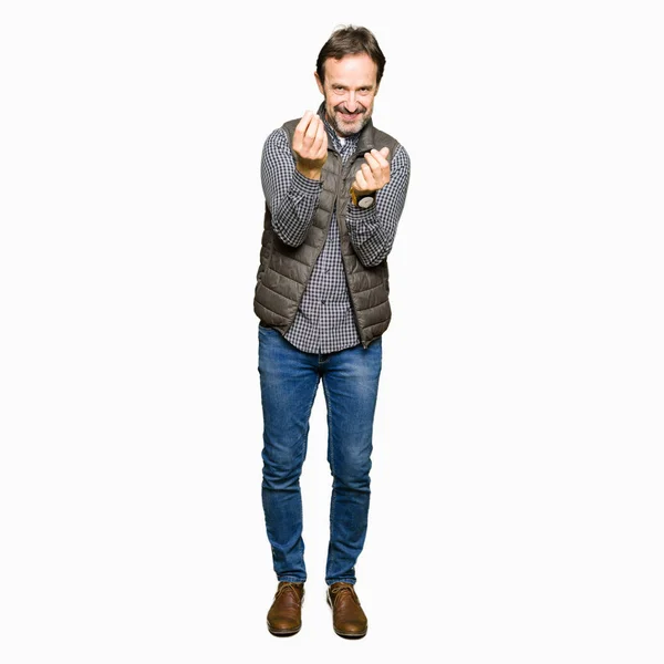 Middle Age Handsome Man Wearing Winter Vest Doing Money Gesture — Stock Photo, Image