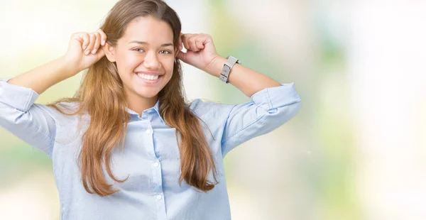 Ung Vacker Brunett Affärskvinna Över Isolerade Bakgrund Leende Dra Öronen — Stockfoto