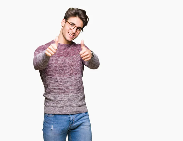 Joven Hombre Guapo Con Gafas Sobre Fondo Aislado Aprobando Hacer —  Fotos de Stock