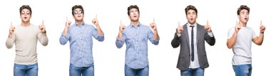 İzole arka plan üzerinde genç yakışıklı iş adamı kolaj şaşırmış ve görünümlü ve parmaklar ve yükseltilmiş kollar ile işaret şaşırttı.