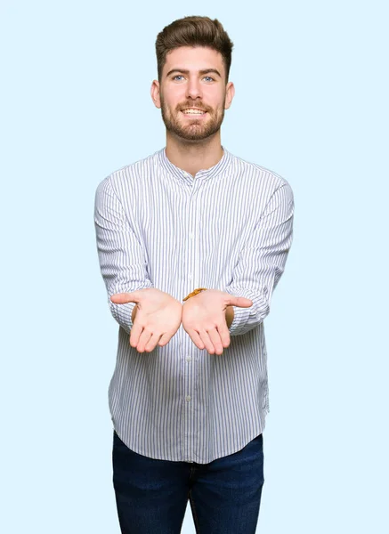 Young Handsome Man Smiling Hands Palms Together Receiving Giving Gesture — Stock Photo, Image