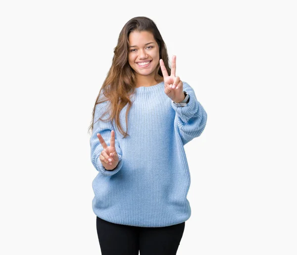 Jonge Mooie Brunette Vrouw Blauwe Winter Trui Dragen Geïsoleerde Achtergrond — Stockfoto