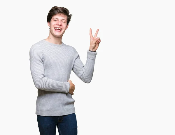 Joven Hombre Guapo Con Suéter Invierno Sobre Fondo Aislado Sonriendo — Foto de Stock