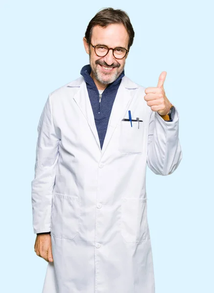 Middle Age Therapist Wearing White Coat Doing Happy Thumbs Gesture — Stock Photo, Image