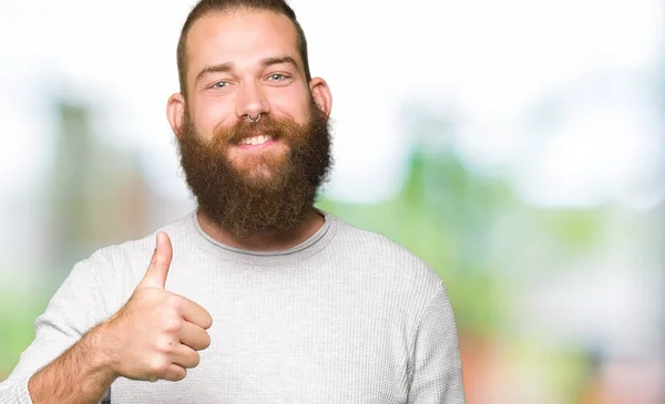 Young Blond Man Wearing Casual Sweater Doing Happy Thumbs Gesture — Stock Photo, Image