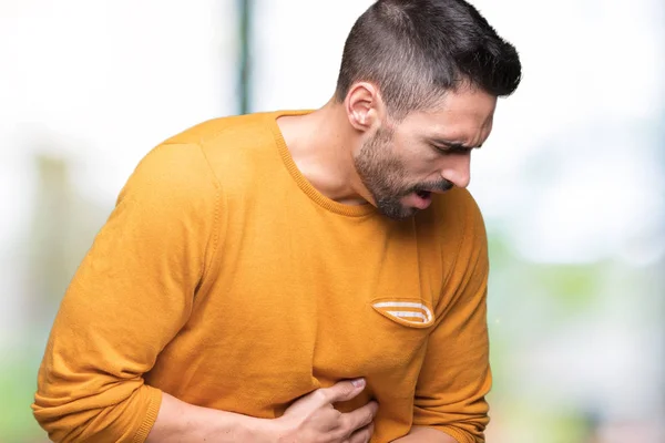 Joven Hombre Guapo Sobre Fondo Aislado Con Mano Estómago Porque — Foto de Stock