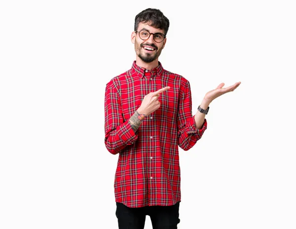 Young Handsome Man Wearing Glasses Isolated Background Amazed Smiling Camera — Stock Photo, Image