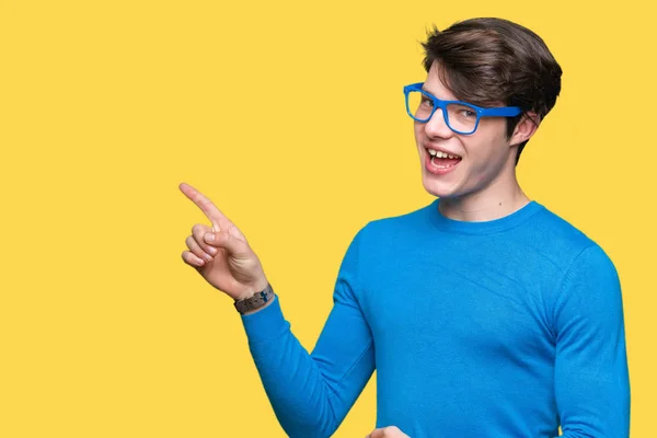 Ung Stilig Man Bär Blå Glasögon Över Isolerad Bakgrund Med — Stockfoto