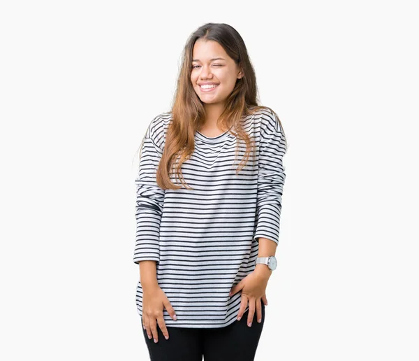 Young Beautiful Brunette Woman Wearing Stripes Sweater Isolated Background Winking — Stock Photo, Image