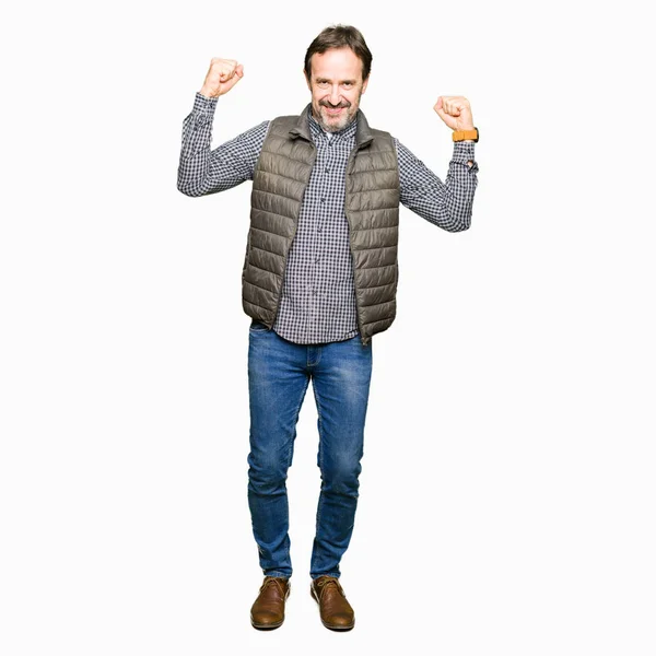 Middle Age Handsome Man Wearing Winter Vest Showing Arms Muscles — Stock Photo, Image