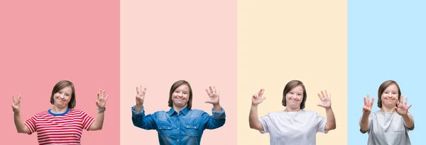 拼贴的唐氏综合症妇女超过五颜六色的条纹孤立的背景显示和指向手指8号 同时微笑自信和快乐 — 图库照片
