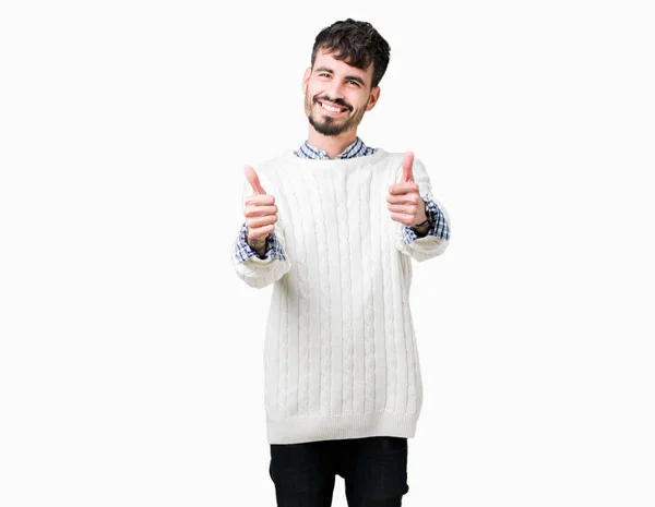 Joven Hombre Guapo Con Suéter Invierno Sobre Fondo Aislado Aprobando —  Fotos de Stock