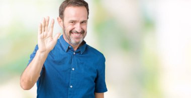 Yakışıklı orta yaş zarif komuta sizde izole arka plan Waiving mutlu selam söyleyerek üzerinde ve gülümseyen, dostça karşılama jest