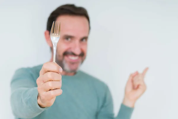 Senior Man Holding Silver Fork Isolated Background Very Happy Pointing Royalty Free Stock Images