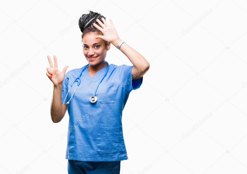 Young braided hair african american girl professional surgeon over isolated background showing and pointing up with fingers number eight while smiling confident and happy.