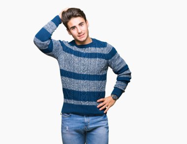 Yakışıklı delikanlı izole arka plan üzerinde yanıltır ve soru hakkında merak ediyorum. Şüphe, kafasına el ile düşünme ile belirsiz. Dalgın kavramı.