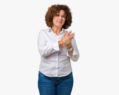 Güzel orta ager üst düzey businees kadın izole arka plan acı acı elleri ve parmakları, artrit inflamasyon