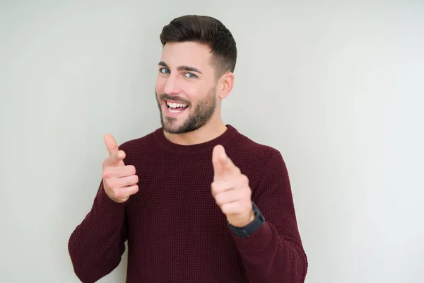 Joven Hombre Guapo Usando Suéter Sobre Fondo Aislado Señalando Los —  Fotos de Stock