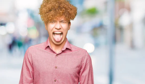 Joven Hombre Negocios Guapo Con Pelo Afro Sacando Lengua Feliz —  Fotos de Stock