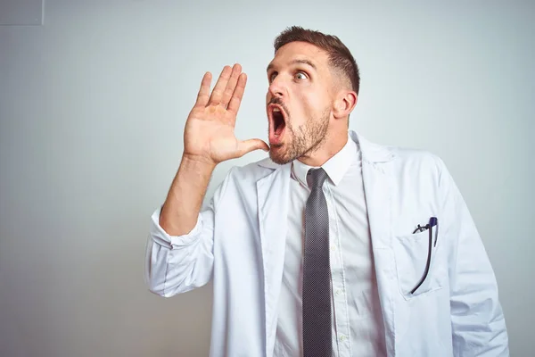 Young Handsome Doctor Man Wearing White Profressional Coat Isolated Background — Stock Photo, Image