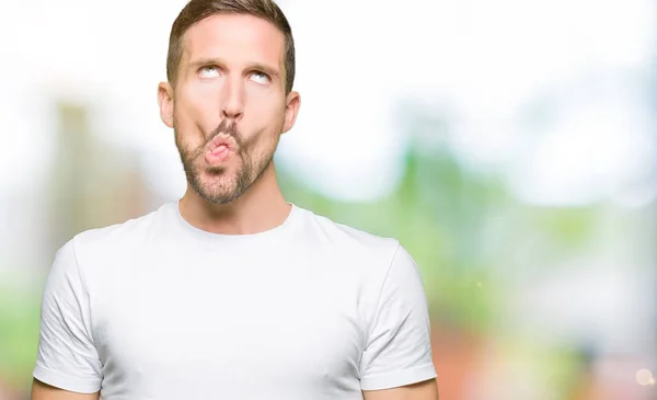 Handsome Man Wearing Casual White Shirt Making Fish Face Lips — Stock Photo, Image