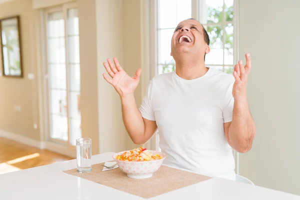 Middle Age Man Eating Rice Home Crazy Mad Shouting Yelling — Stock Photo, Image