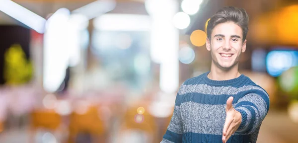 Young Handsome Man Isolated Background Smiling Friendly Offering Handshake Greeting — Stock Photo, Image